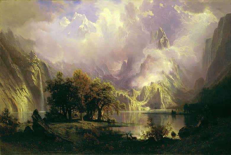 A realistic art example showing a canvas painting of mountains and a lake.